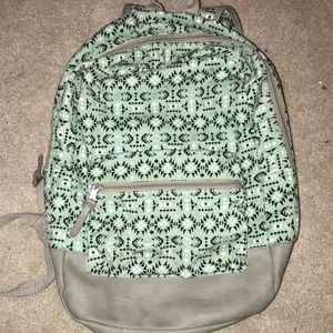 Grey and mint patterned backpack